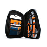 GSI camping kitchen set contents showing collapsible whisk pivot spoon spatula cutting board and condiment bottles